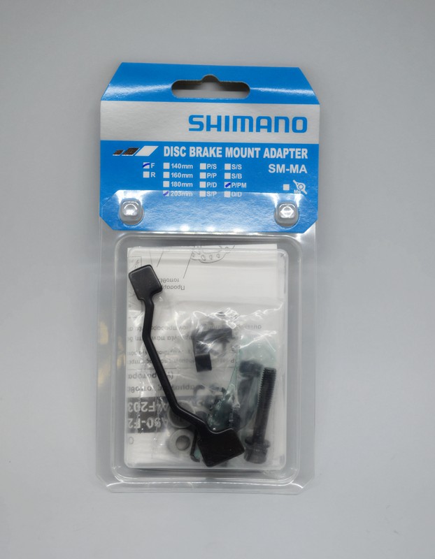 ADAPTER ZA DISK KOČNICU SHIMANO SM-MA-F203P/PM  FIXING BOLT(LONG X1  SHORT X1)  SNAP RING(NEW) X1  WASHER-A X2  WASHER-B X2  IND.PACK